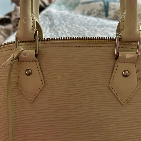 Authentic Louis Vuitton Ivory Epi Alma Textured Leather Bag - Picture 11 of 15